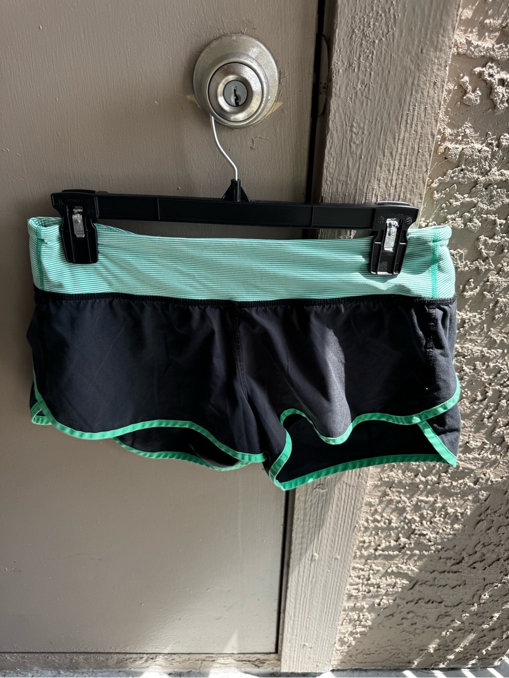 Lululemon Size 6 Navy Run Shorts with Mint Trim